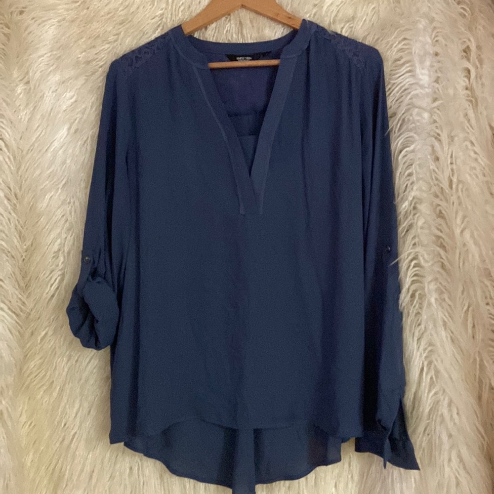 Simply Vera blue blouse with lace design on upper back.